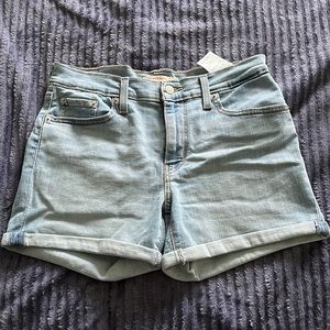 Levi Jean mid length shorts